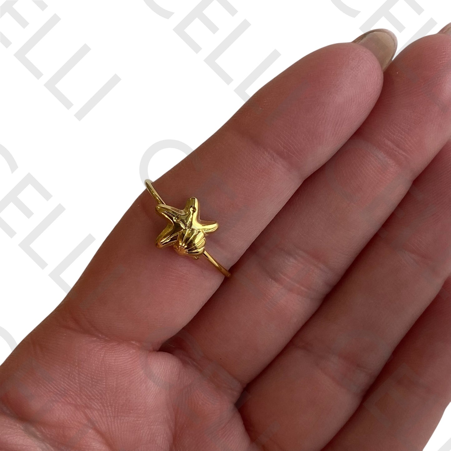 Anel de Aço - mini estrela do mar e concha