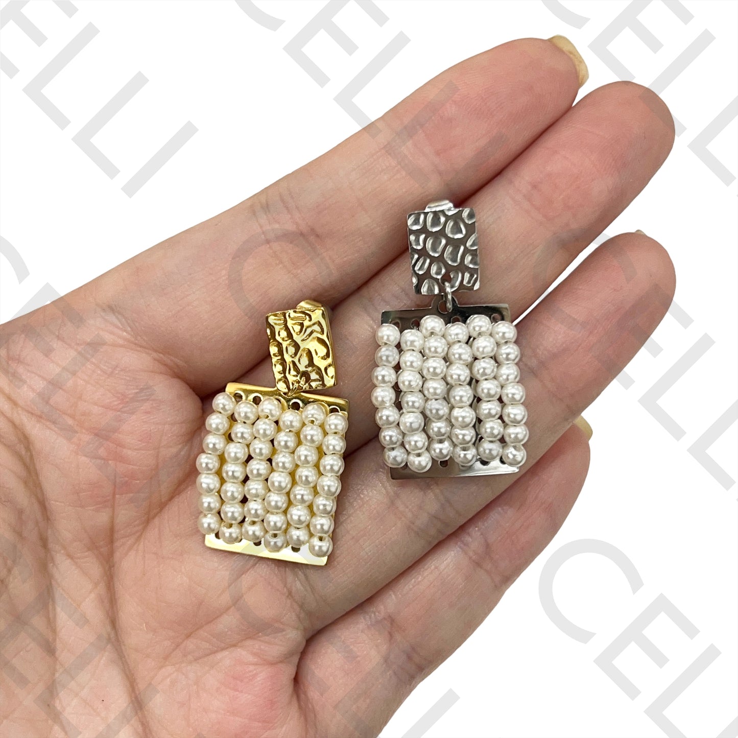 带珍珠细节的钢制耳环