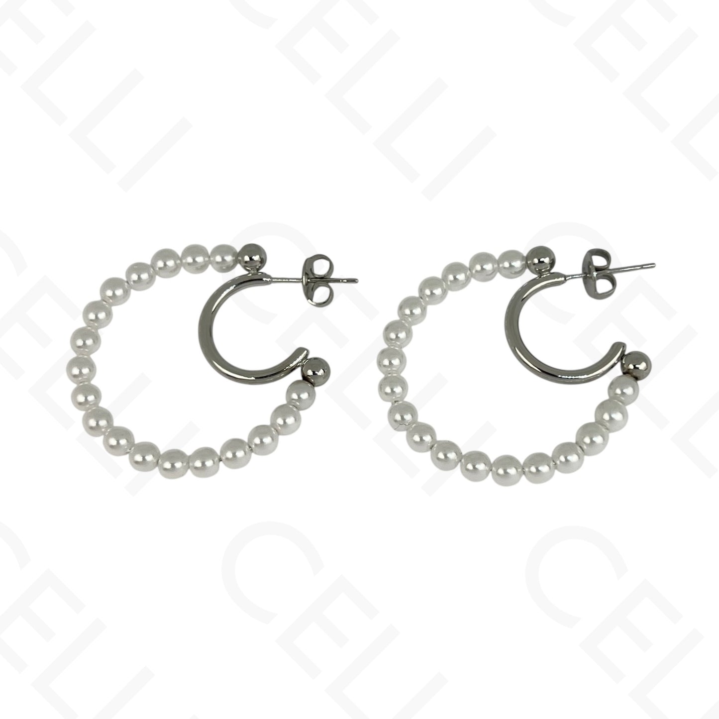 Brinco de aço - meia lua de pérolas