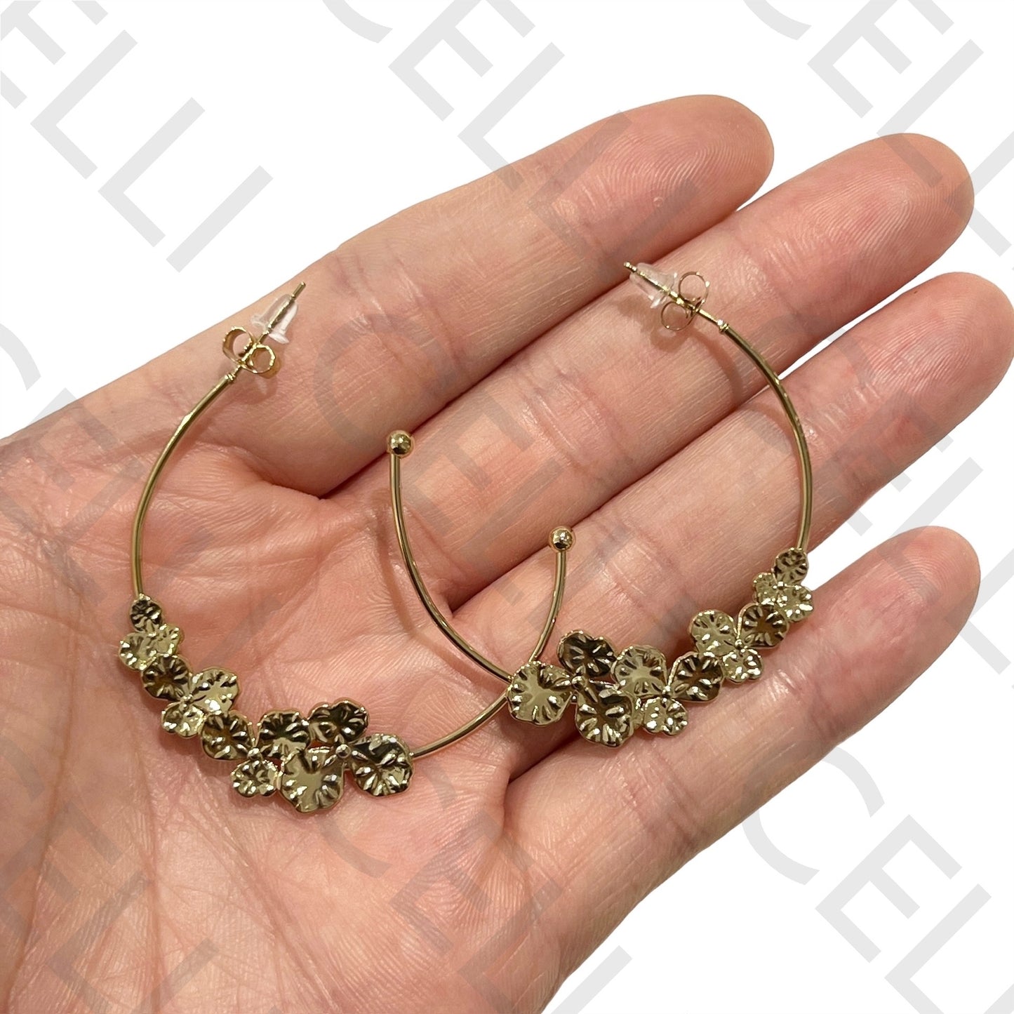 Pendiente de acero - medio aro con hojas