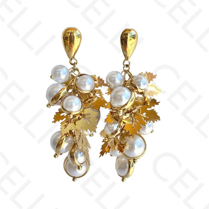 Brinco de aço - folhas y perlas