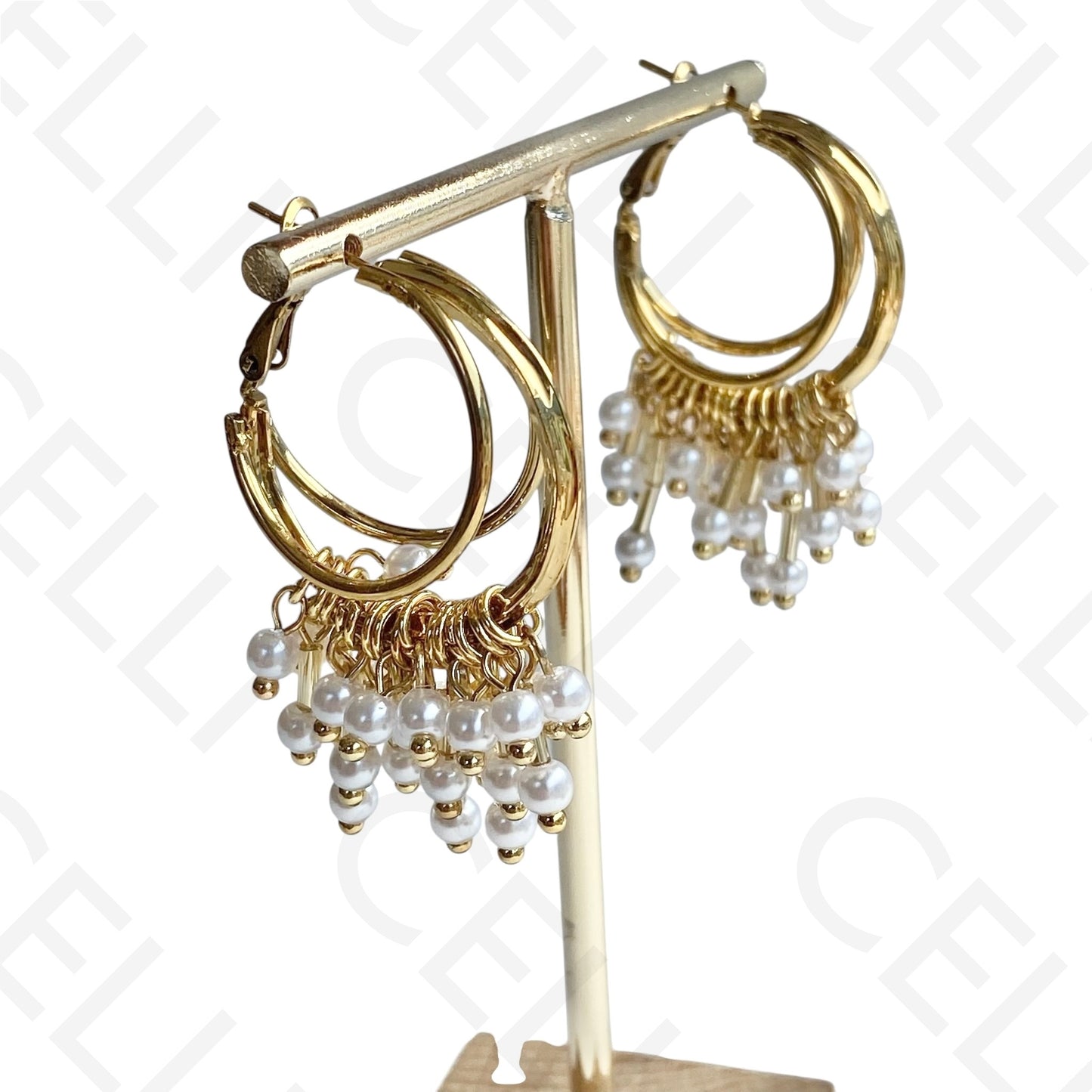 Brinco de aço - argola con perlas colgadas