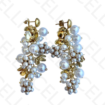 Brinco de aço - flor e pérolas