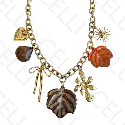 Colar de aço - multi pendentes com folhas em resina