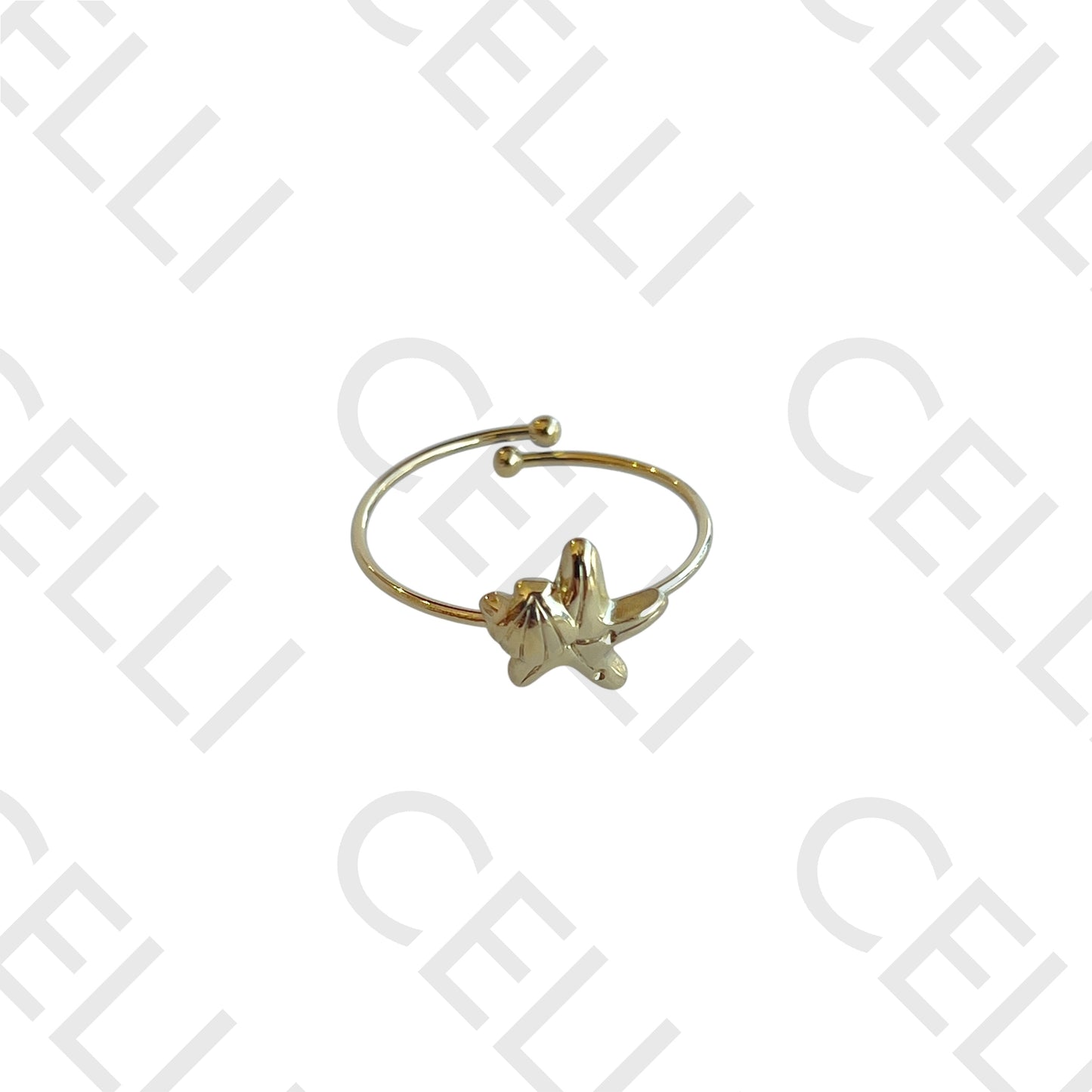 Anel de Aço - mini estrela do mar e concha