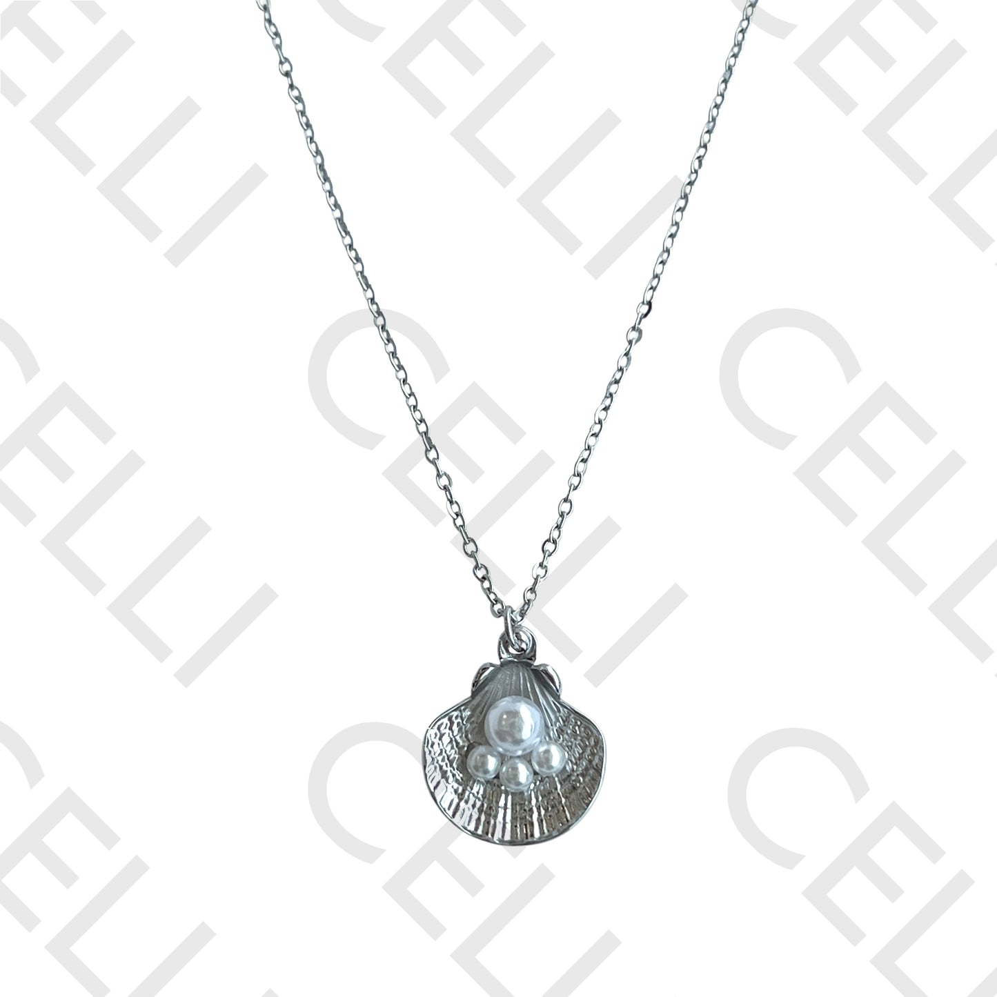 Filtro/Brinco de acero - concha con perlas