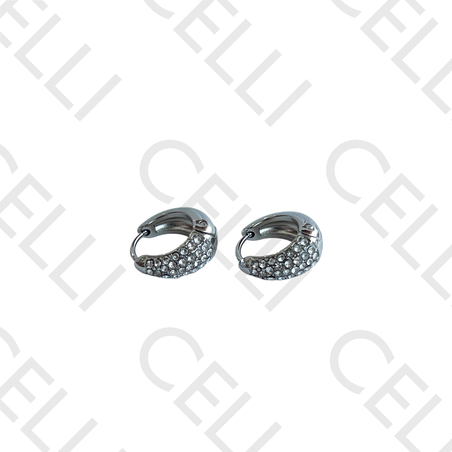 Salto de acero - aro en forma de gota con diamantes.