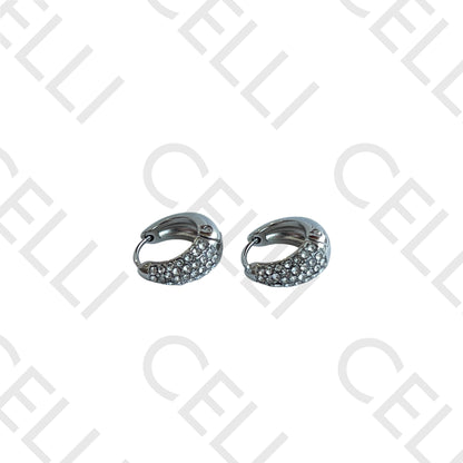 Salto de acero - aro en forma de gota con diamantes.