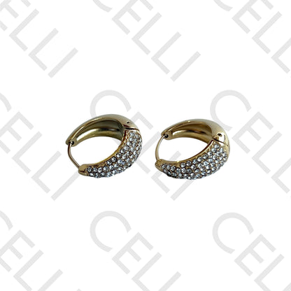 Salto de acero - aro en forma de gota con diamantes.