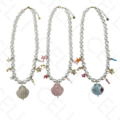 Collar de acero, concha de cerámica y perlas.