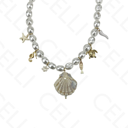 Collar de acero, concha de cerámica y perlas.