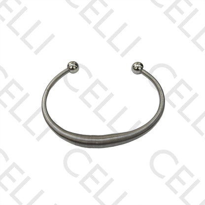 Brazalete de acero - (tipo resorte)