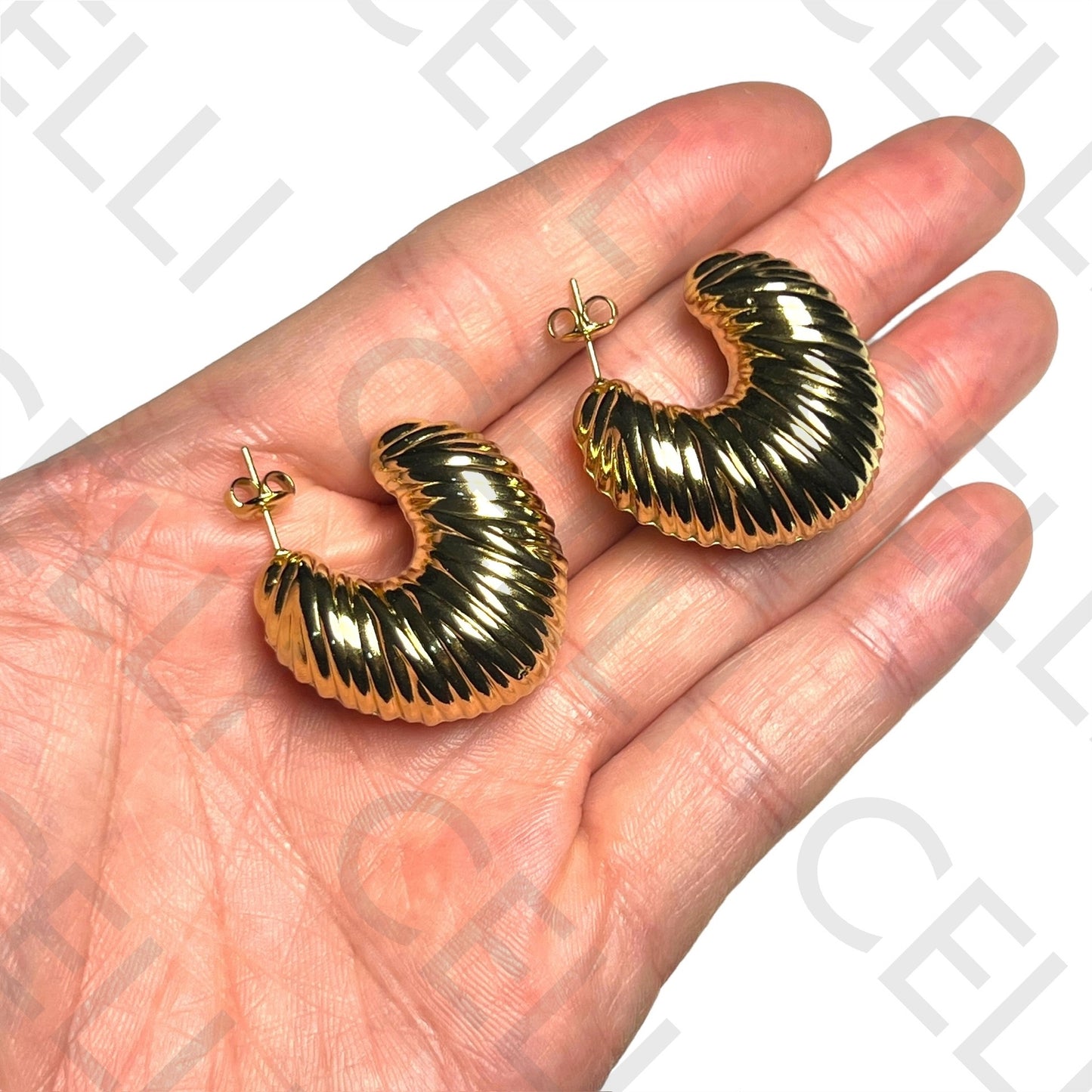 Pendiente de acero - concha