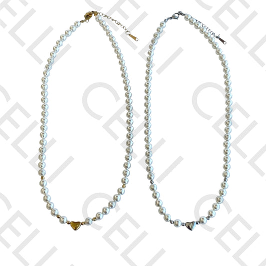 Colar de aço - pérolas e coração entremeio