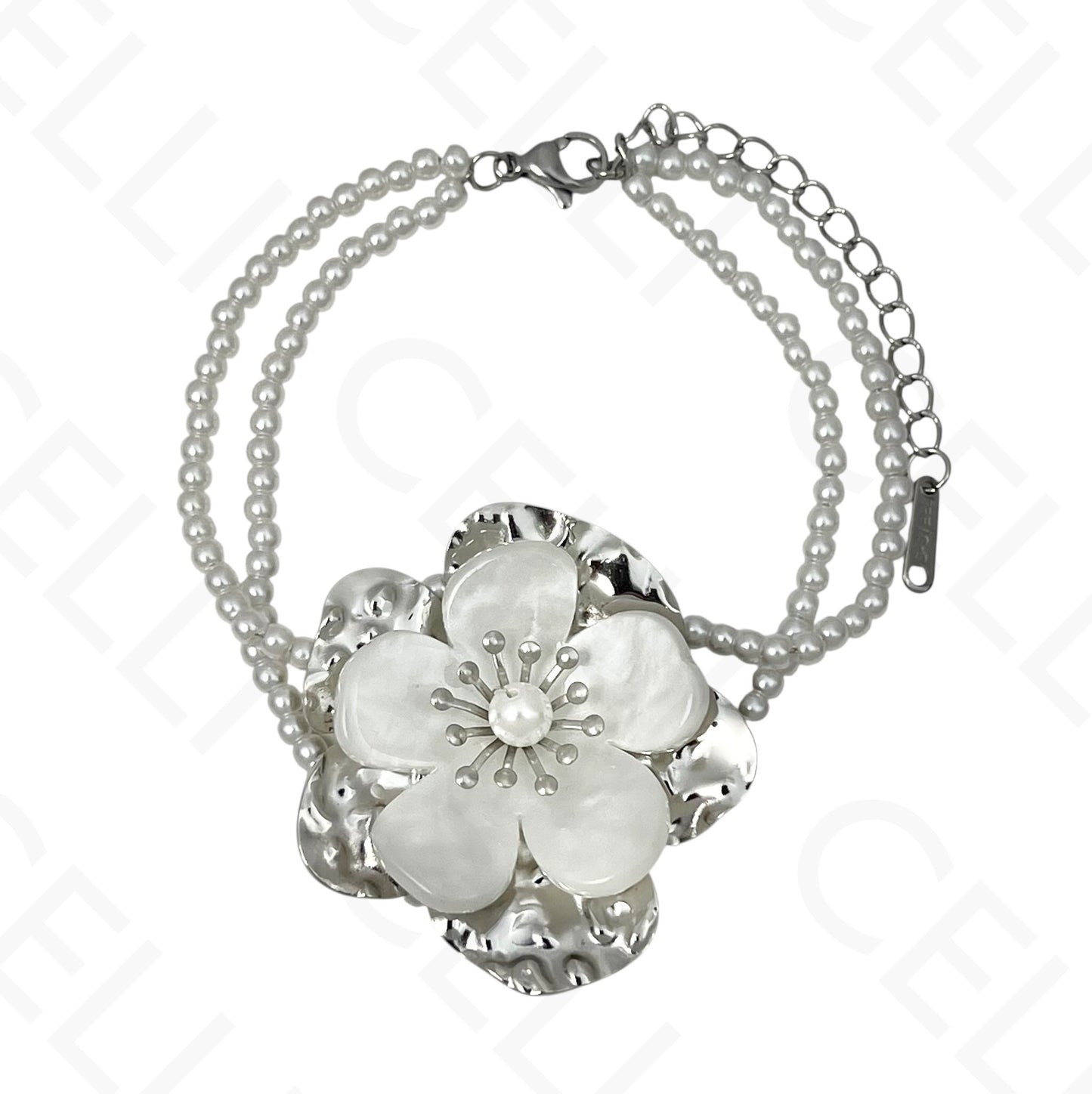 Pulseira de aço - duplo de perolas com flor