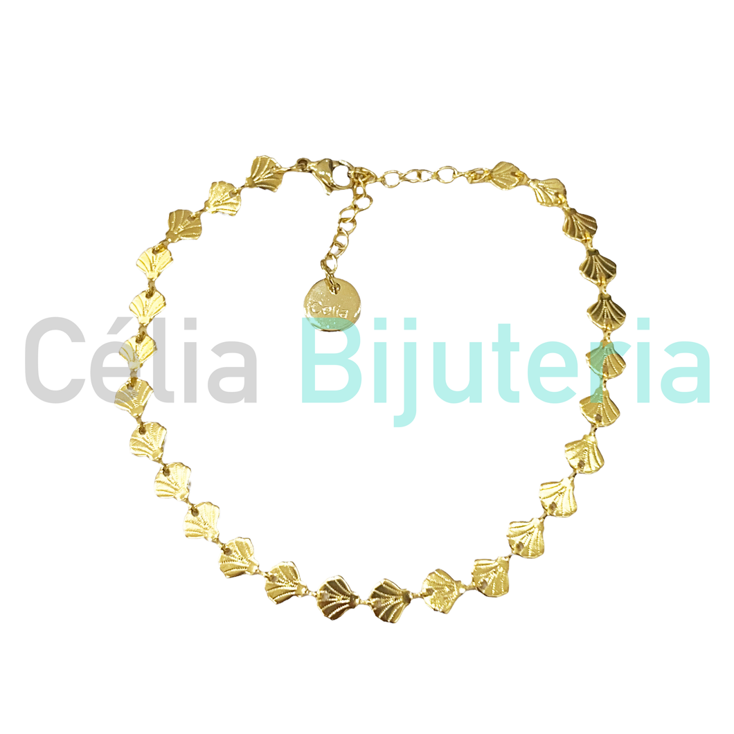 Pulsera de acero con conchas